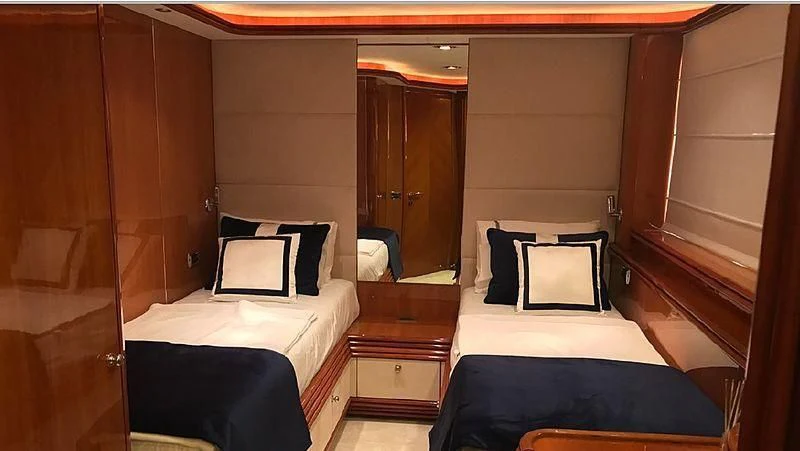 a room with two beds aboard NATALIA Yacht for Sale