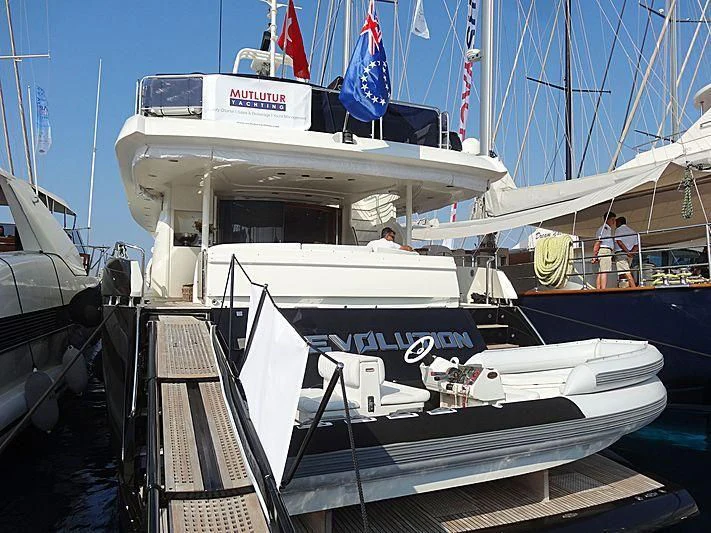 a boat docked at a pier aboard NATALIA Yacht for Sale