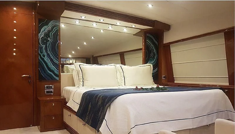 a room with two beds aboard NATALIA Yacht for Sale