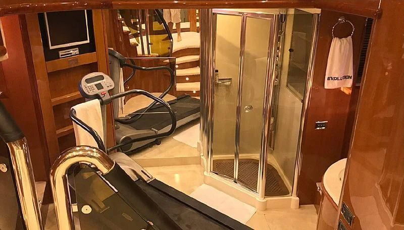 a bathroom with a glass shower aboard NATALIA Yacht for Sale