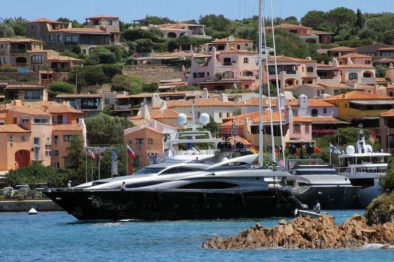 a boat is parked on the shore aboard NATALIA Yacht for Sale