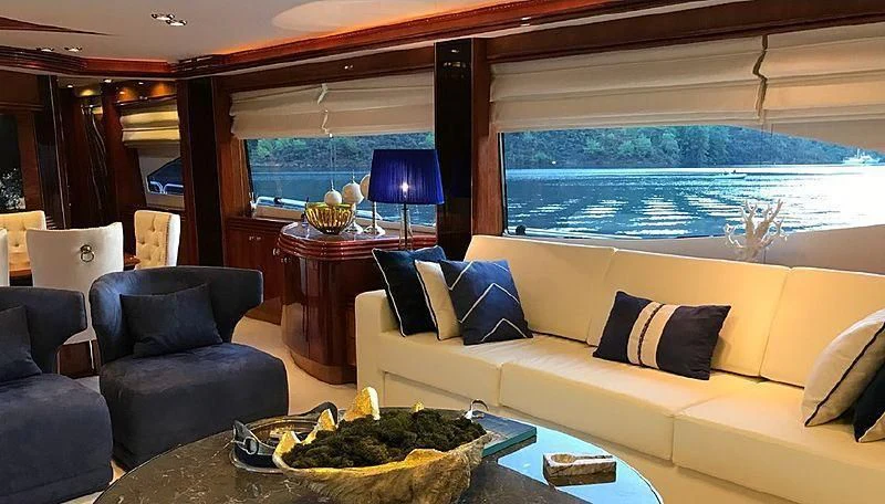 a living room with a large window aboard NATALIA Yacht for Sale