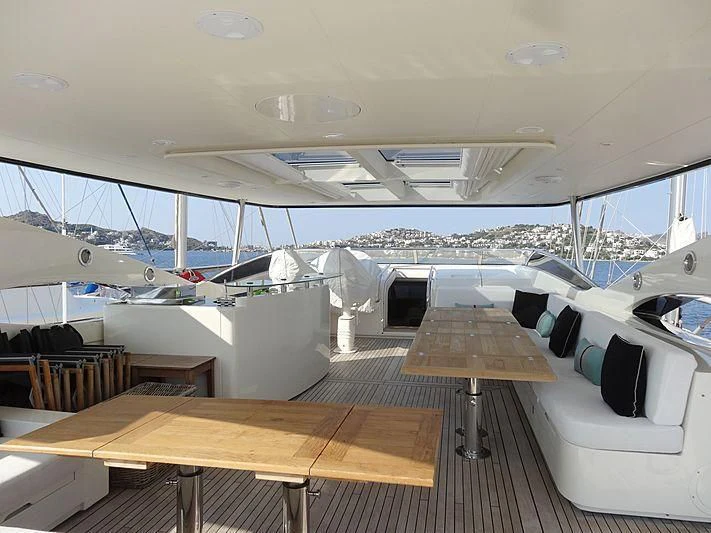 a large room with many boats aboard NATALIA Yacht for Sale