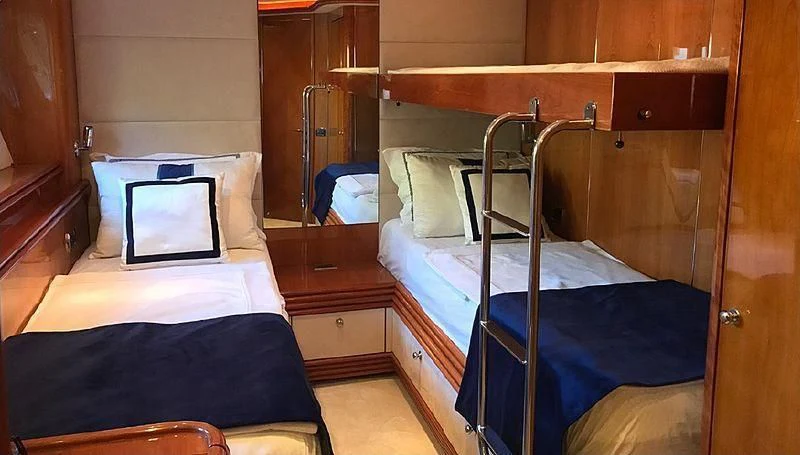 a room with bunk beds aboard NATALIA Yacht for Sale
