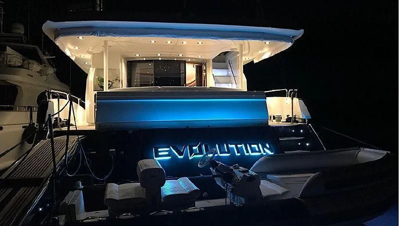 a blue and white boat aboard NATALIA Yacht for Sale
