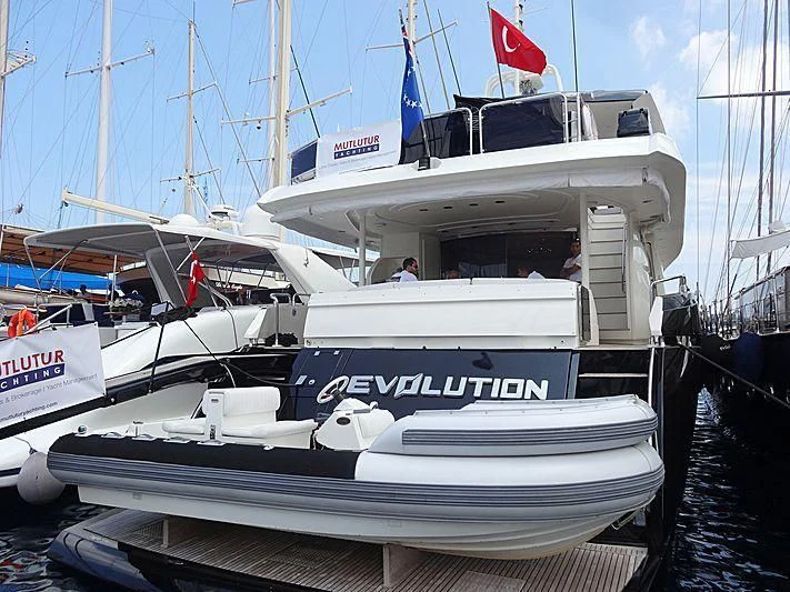 a boat docked at a pier aboard NATALIA Yacht for Sale