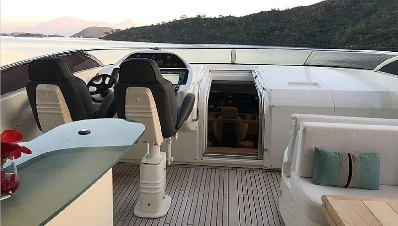 a car with a door open aboard NATALIA Yacht for Sale