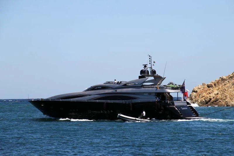 a large military ship in the water aboard NATALIA Yacht for Sale