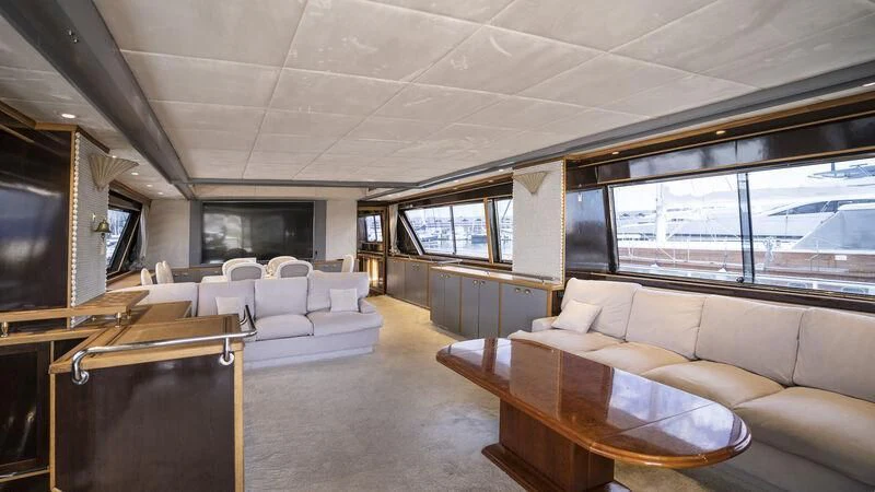 a living room with a large window aboard NEWAL Yacht for Sale