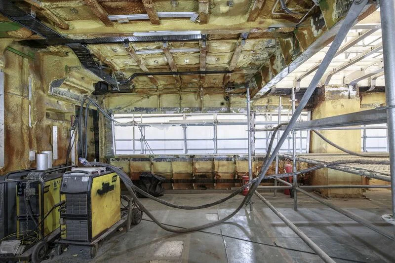 a room with pipes and equipment aboard NEWAL Yacht for Sale