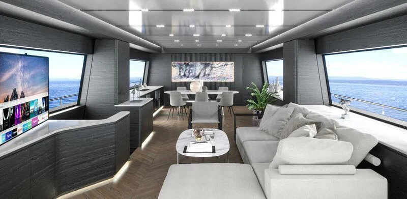 a room with a couch and a tv aboard NEWAL Yacht for Sale