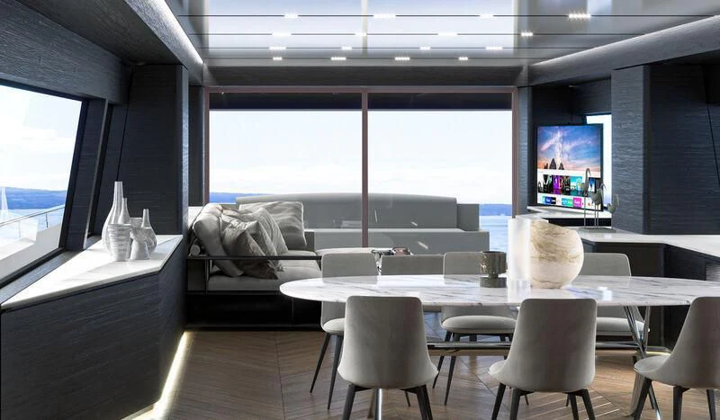 a room with a table and chairs aboard NEWAL Yacht for Sale