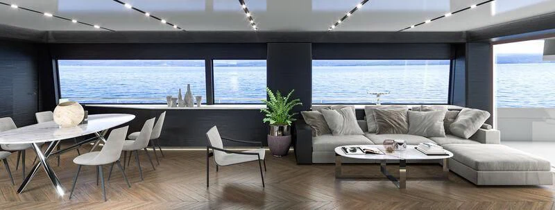 a living room with a couch and a table aboard NEWAL Yacht for Sale