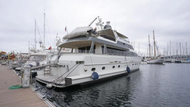 a boat docked at a pier aboard NEWAL Yacht for Sale