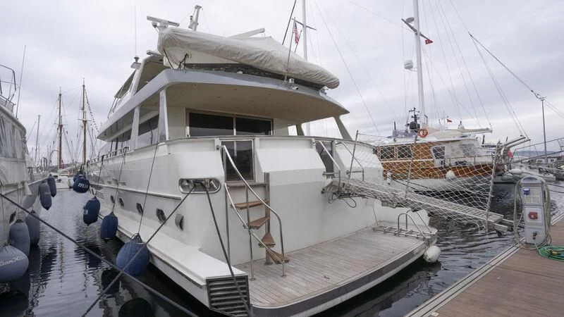a large white boat docked aboard NEWAL Yacht for Sale