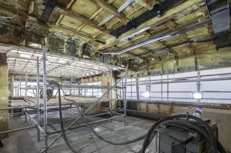 a large warehouse with many steel beams aboard NEWAL Yacht for Sale