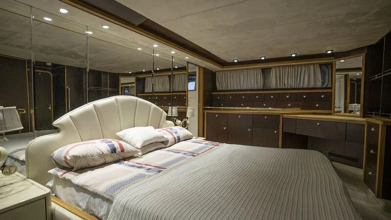 a large bed in a room aboard NEWAL Yacht for Sale