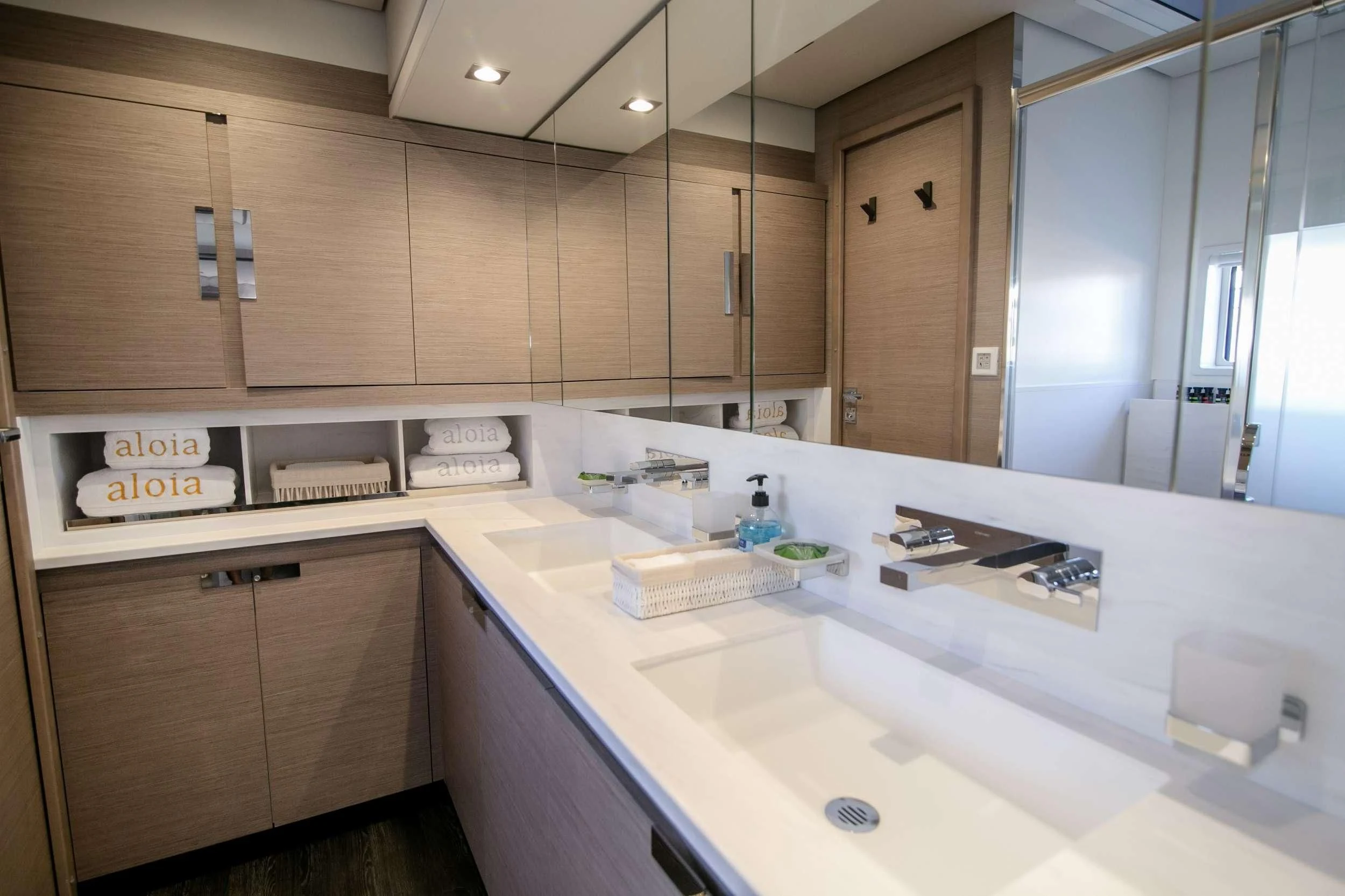 a kitchen with a countertop sink and cabinets aboard ALOIA Yacht for Charter