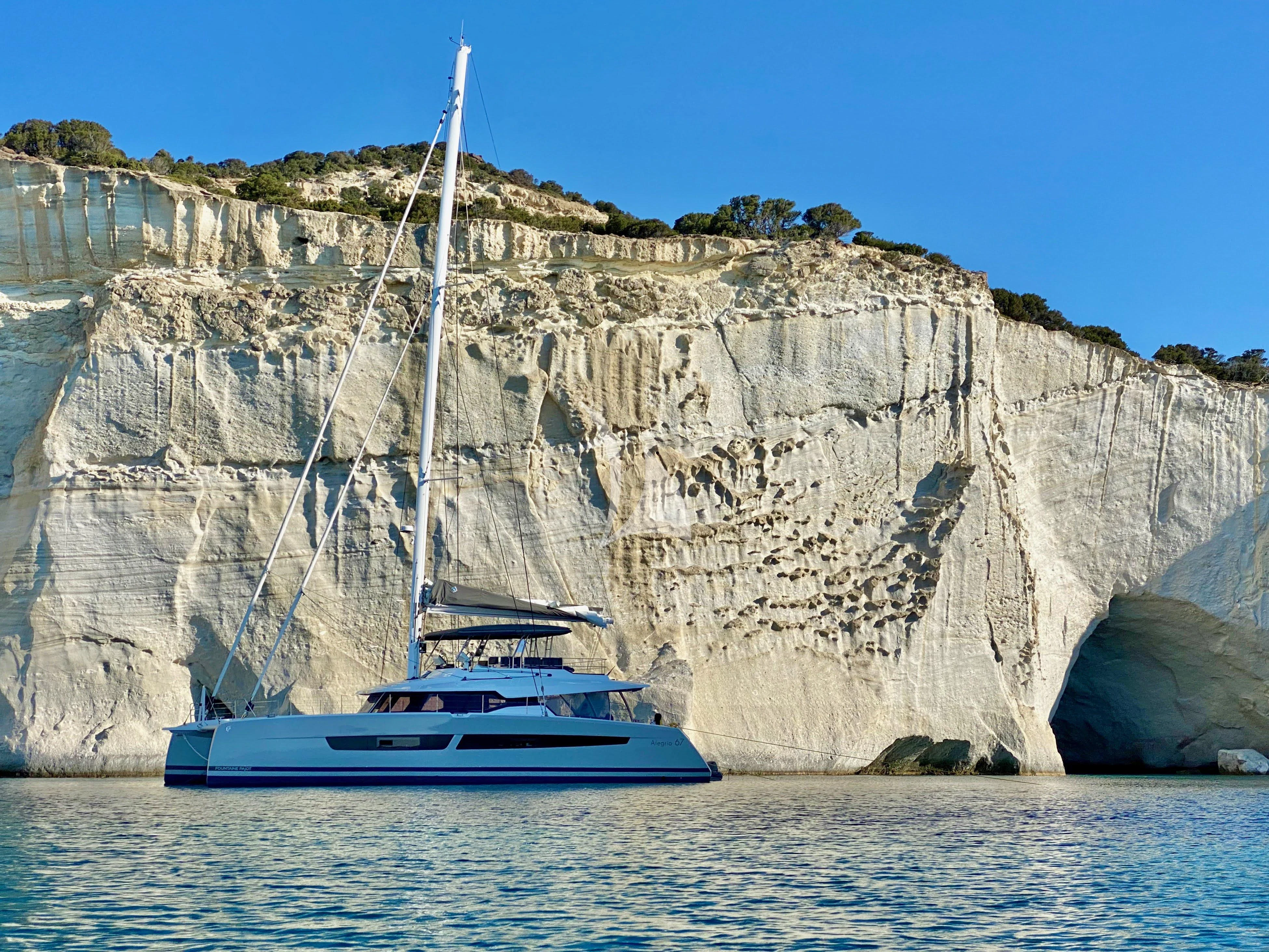 a boat sailing in the water aboard ALOIA Yacht for Charter