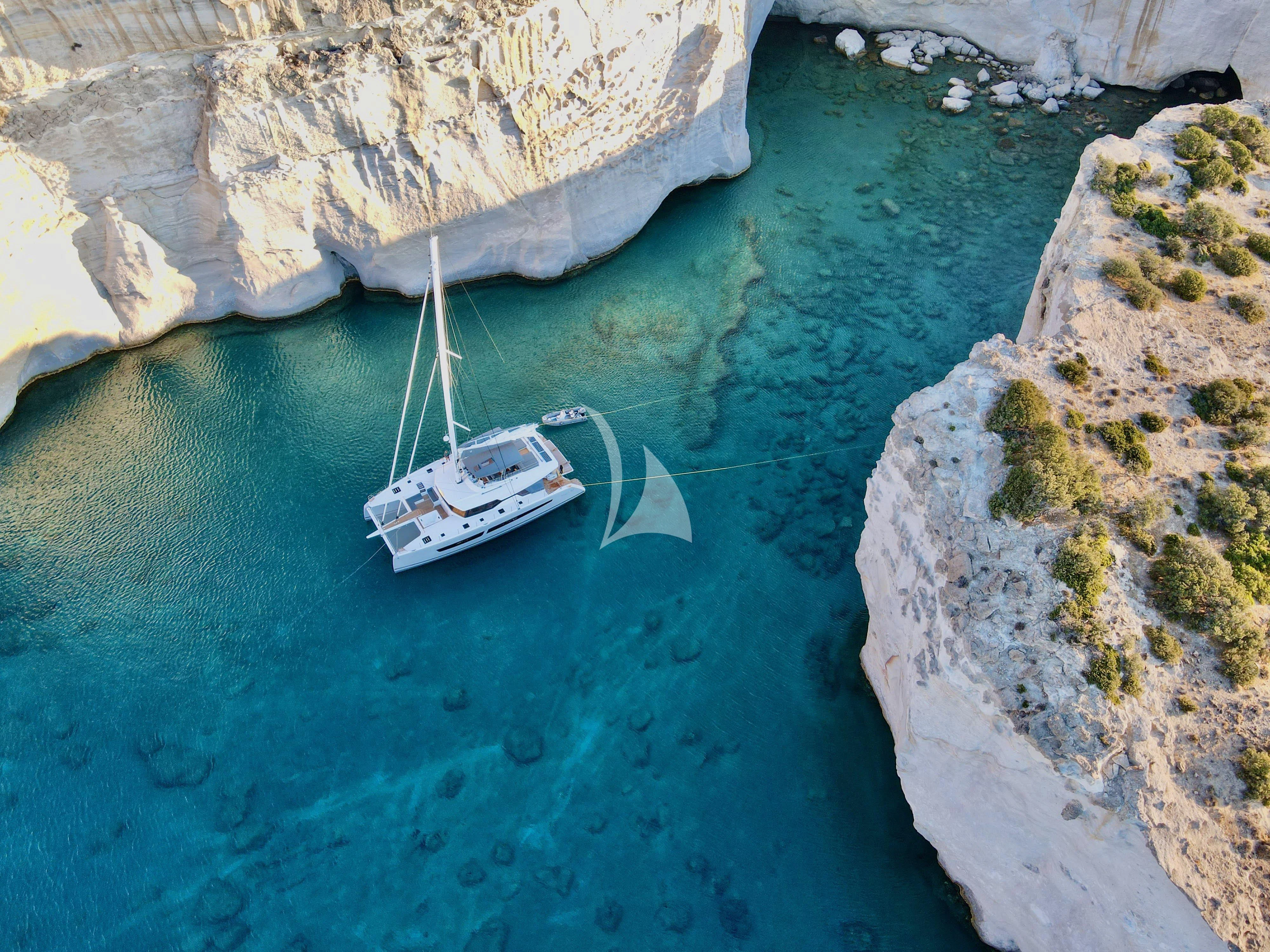 a boat in the water aboard ALOIA Yacht for Charter