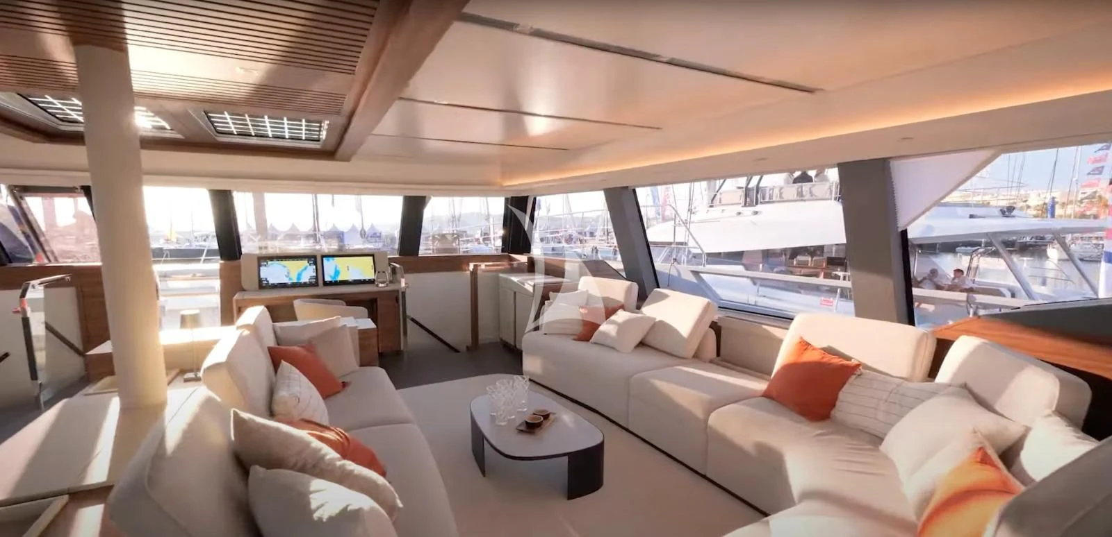 a living room with a large window aboard ALOIA Yacht for Charter