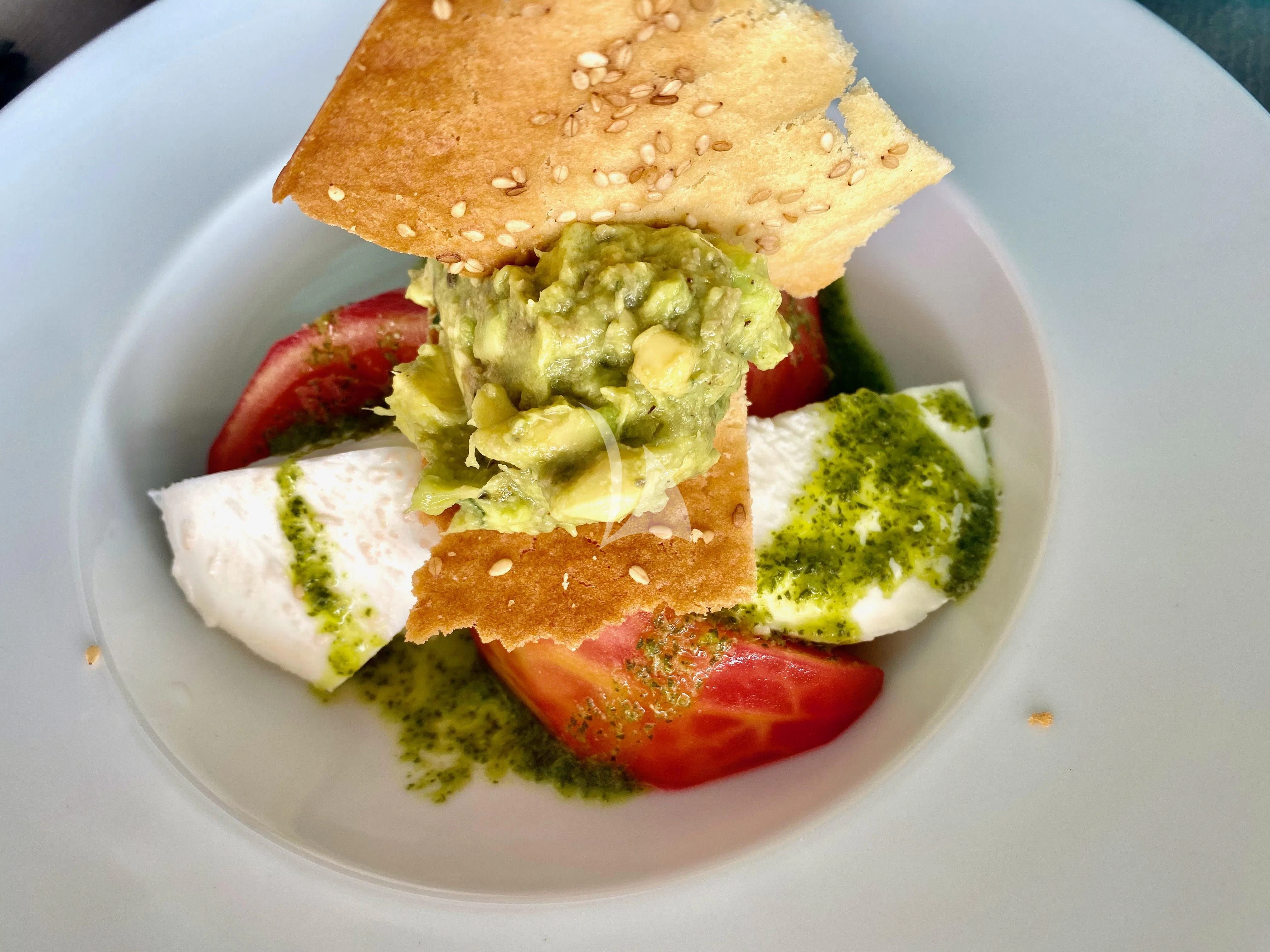 a plate of food aboard ALOIA Yacht for Charter