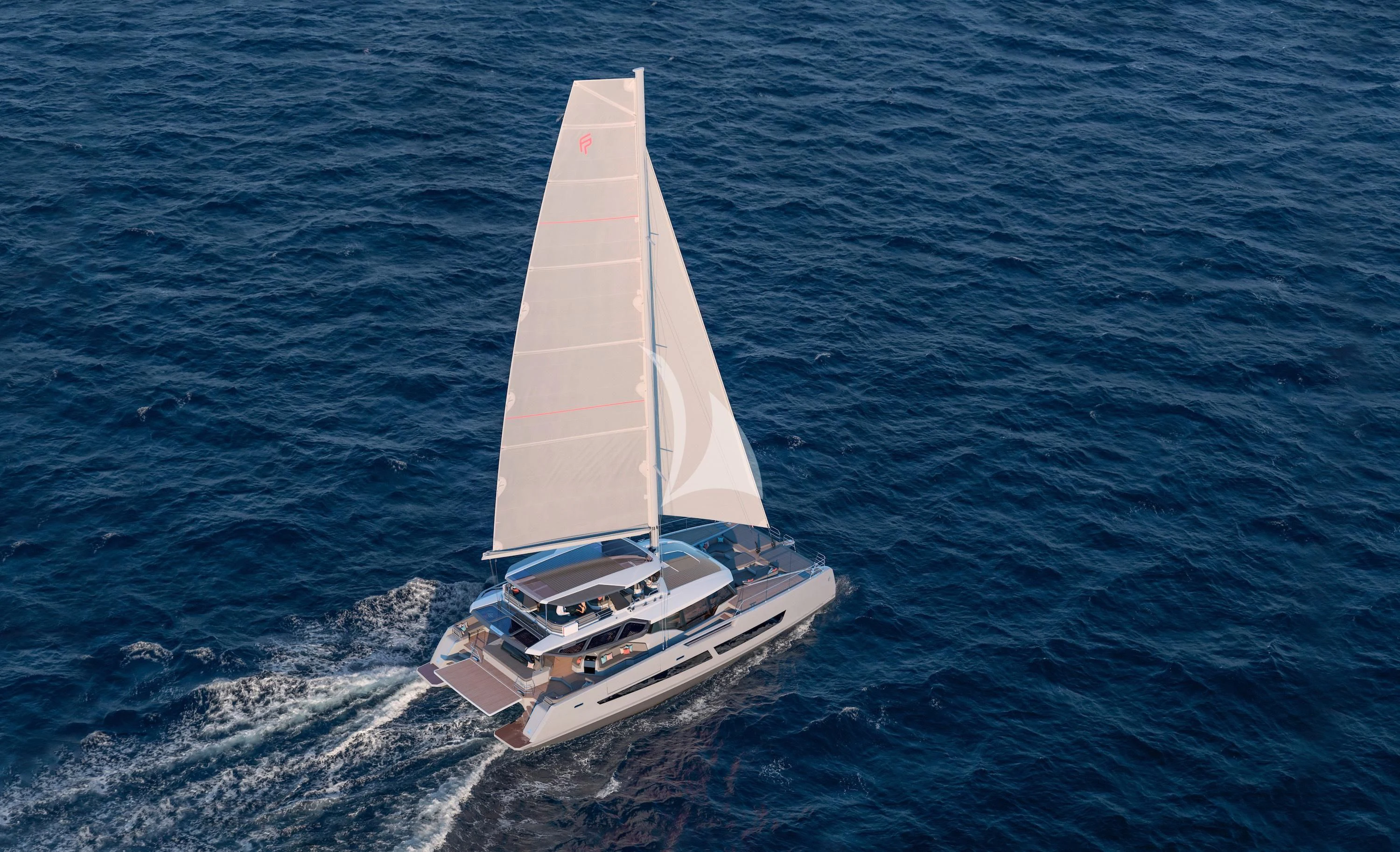 a small white boat in the water aboard ALOIA Yacht for Charter