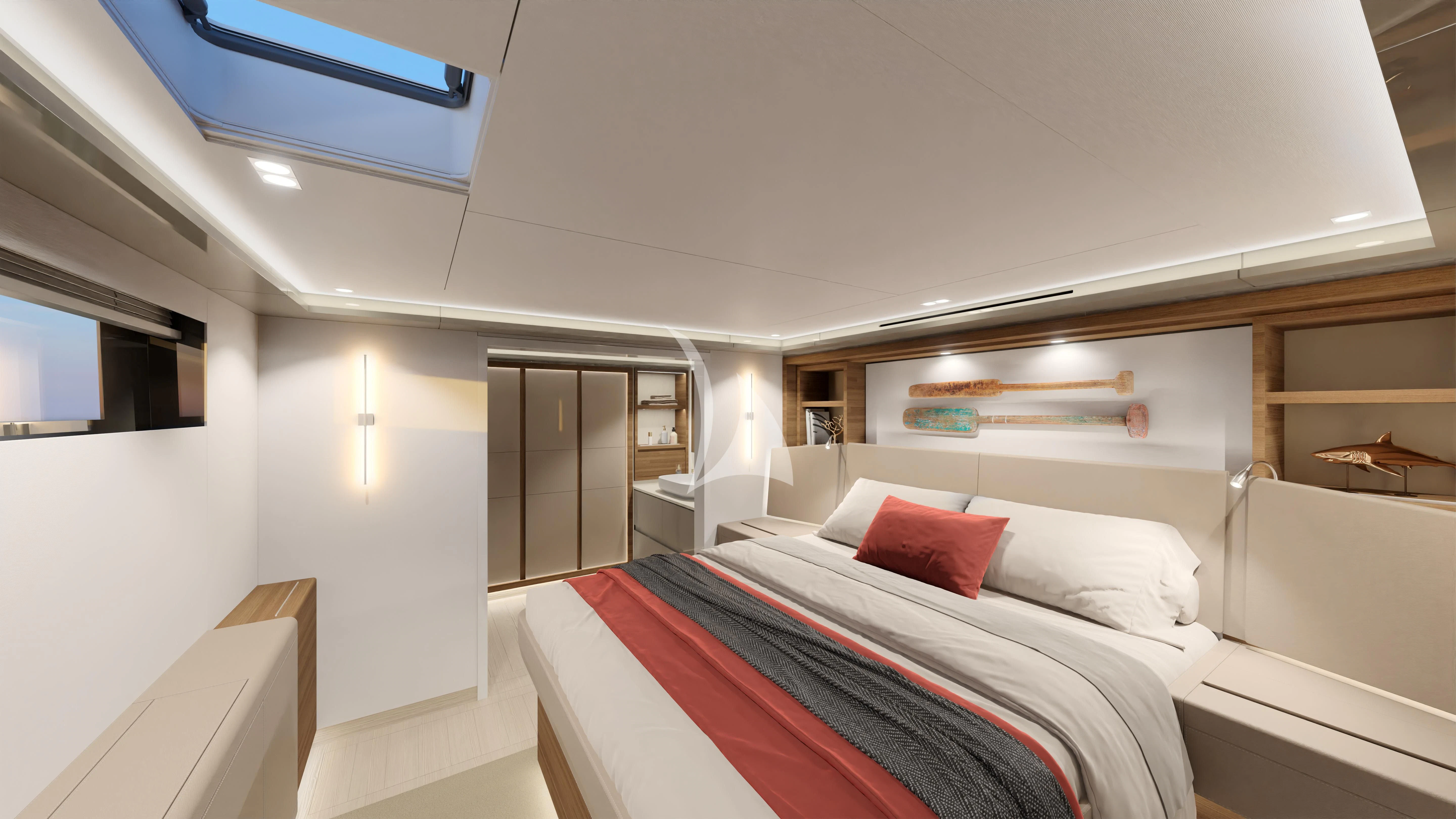 a room with a bed and a desk aboard ALOIA Yacht for Charter