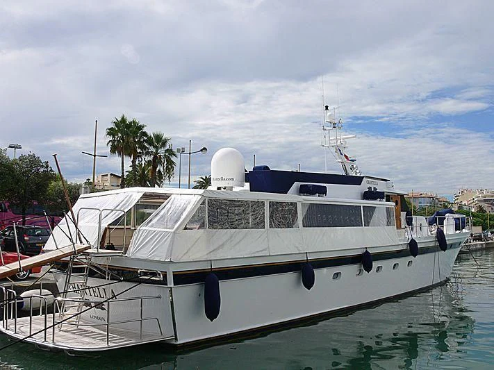 a boat docked at a pier aboard CHANTELLA Yacht for Sale