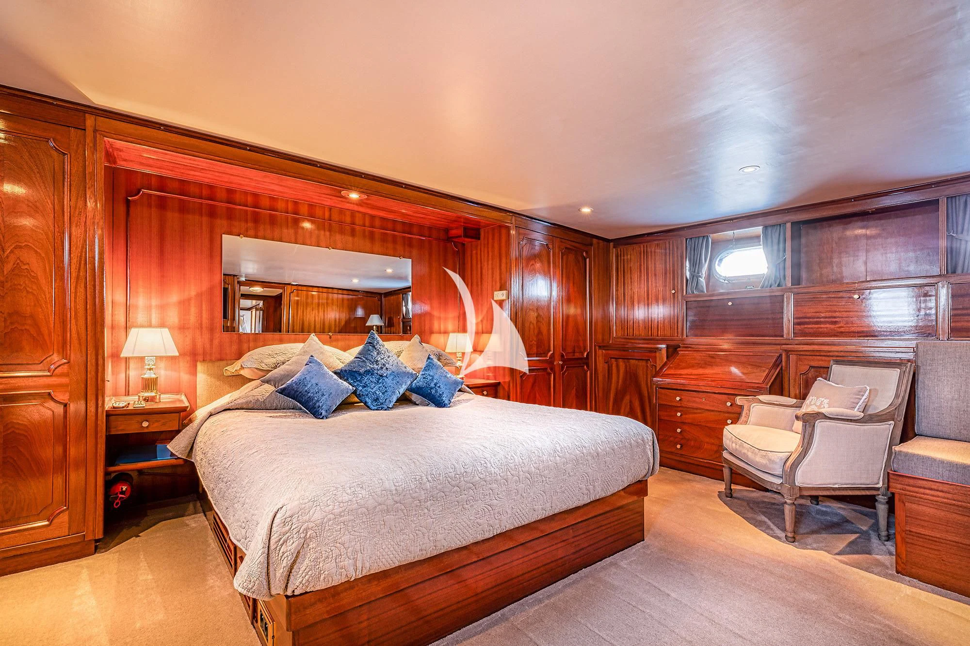 a large bed in a room aboard CHANTELLA Yacht for Sale