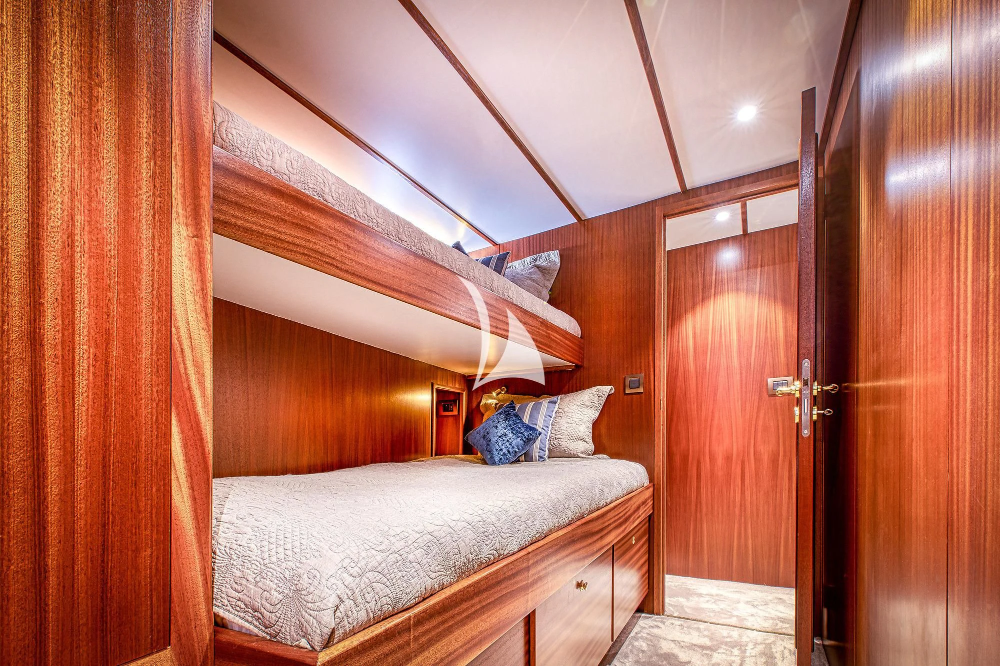 a bed in a room aboard CHANTELLA Yacht for Sale