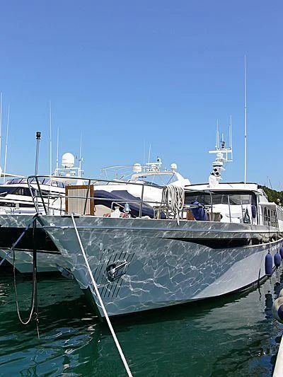 a boat docked at a pier aboard CHANTELLA Yacht for Sale