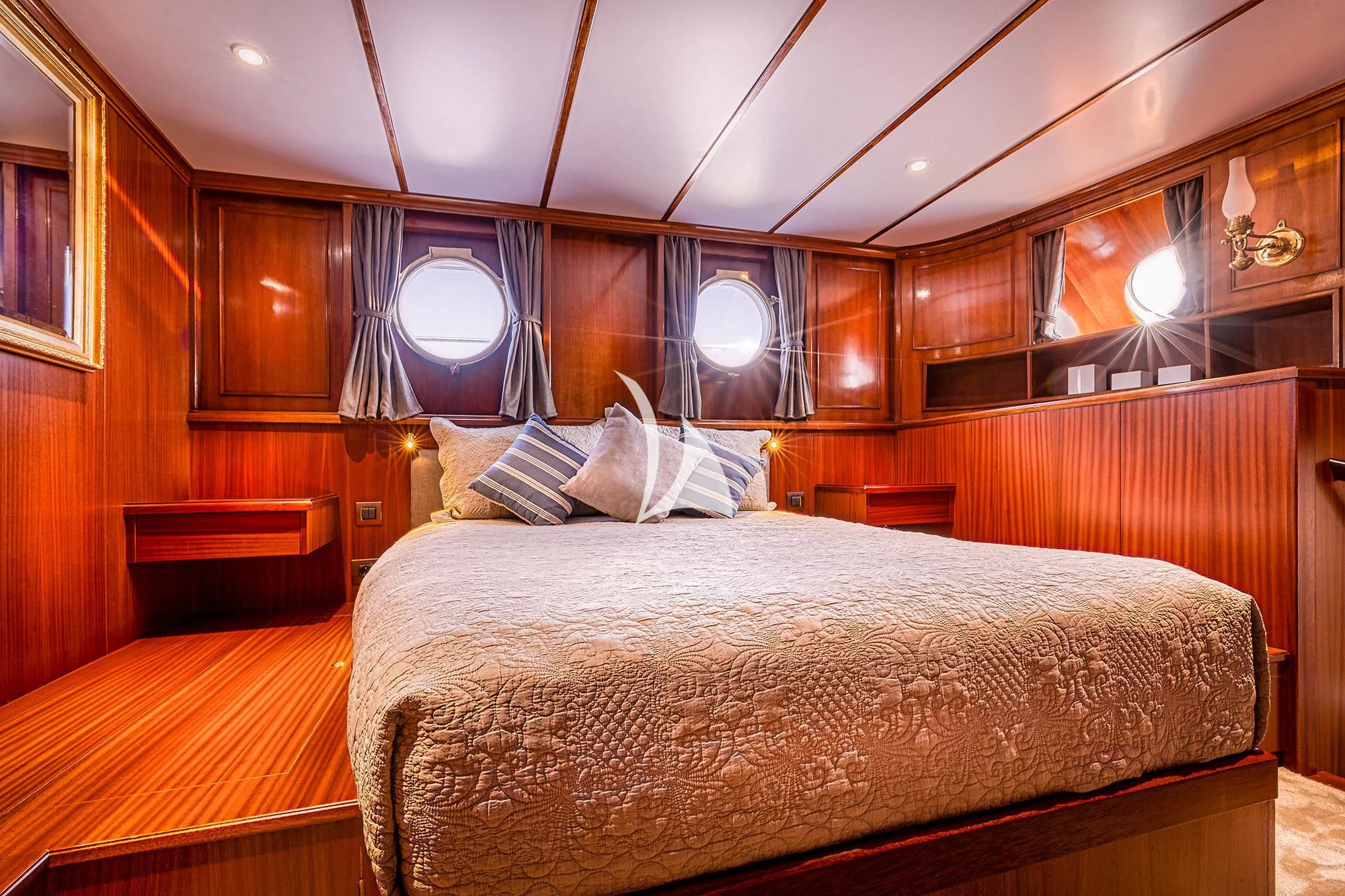 a bed in a room aboard CHANTELLA Yacht for Sale