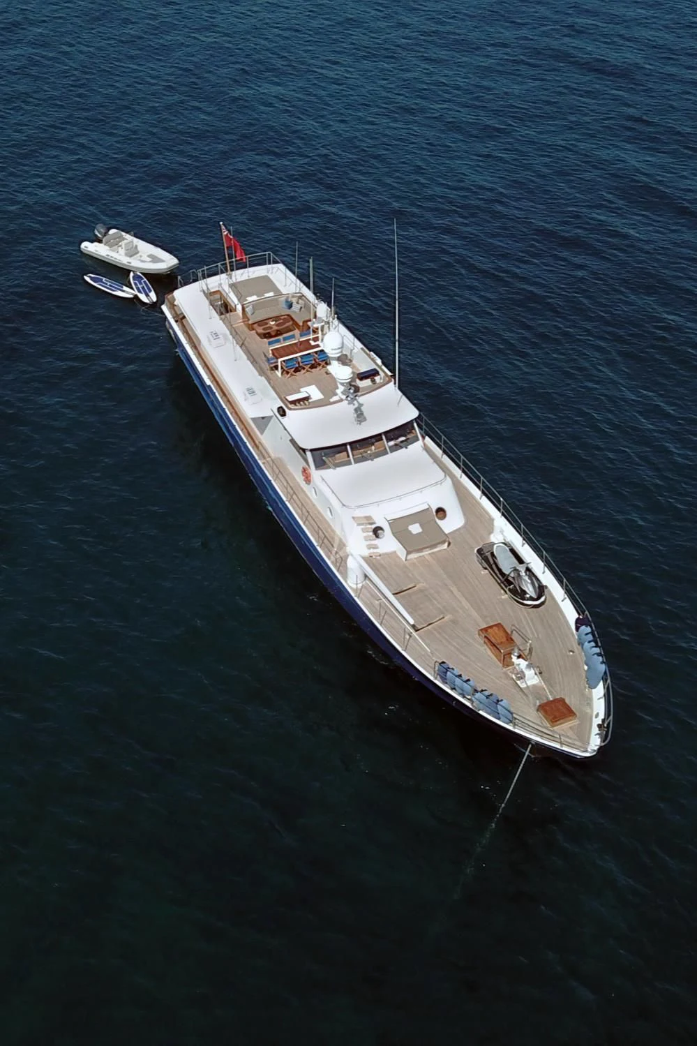 a large ship in the water aboard CHANTELLA Yacht for Sale