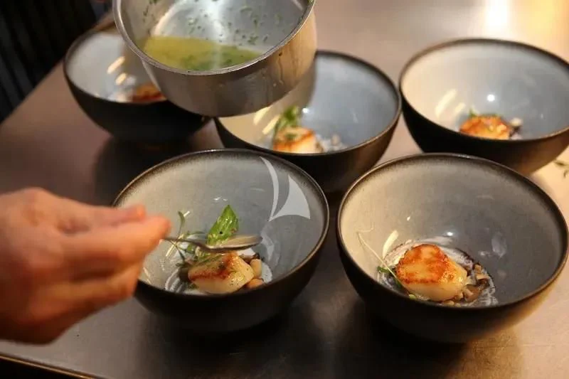 a group of bowls with food in them aboard CHANTELLA Yacht for Sale