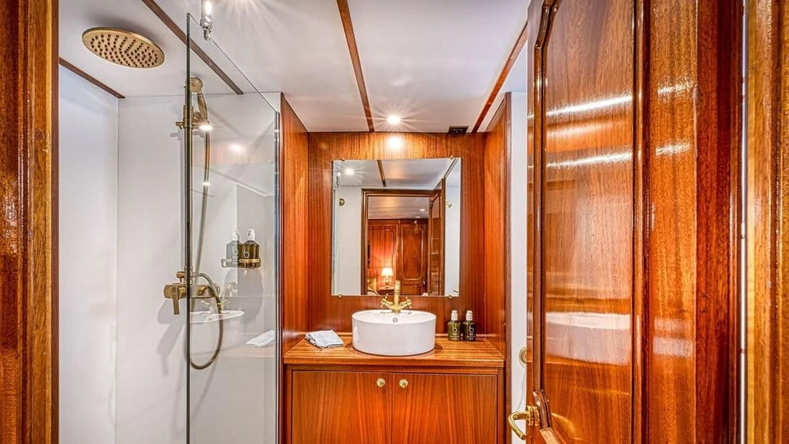 a bathroom with a shower unit and sink aboard CHANTELLA Yacht for Sale