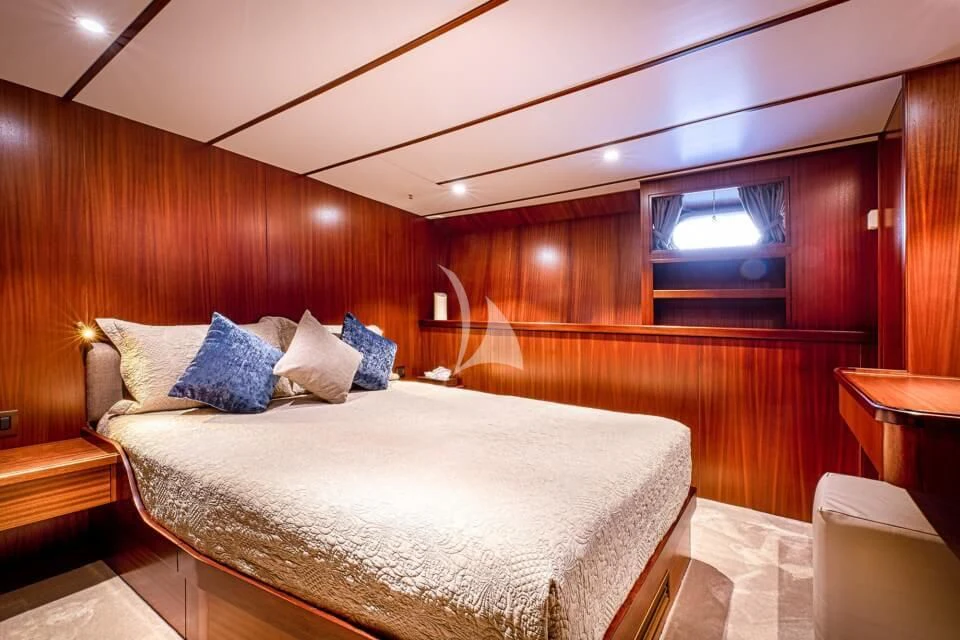 a bed in a room aboard CHANTELLA Yacht for Sale