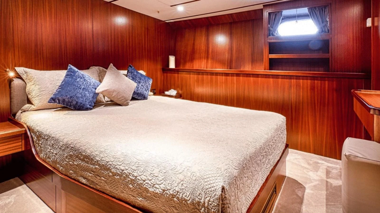a bed with pillows aboard CHANTELLA Yacht for Sale