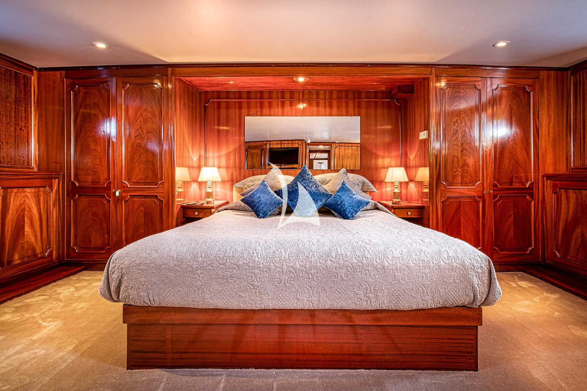 a bed in a room aboard CHANTELLA Yacht for Sale