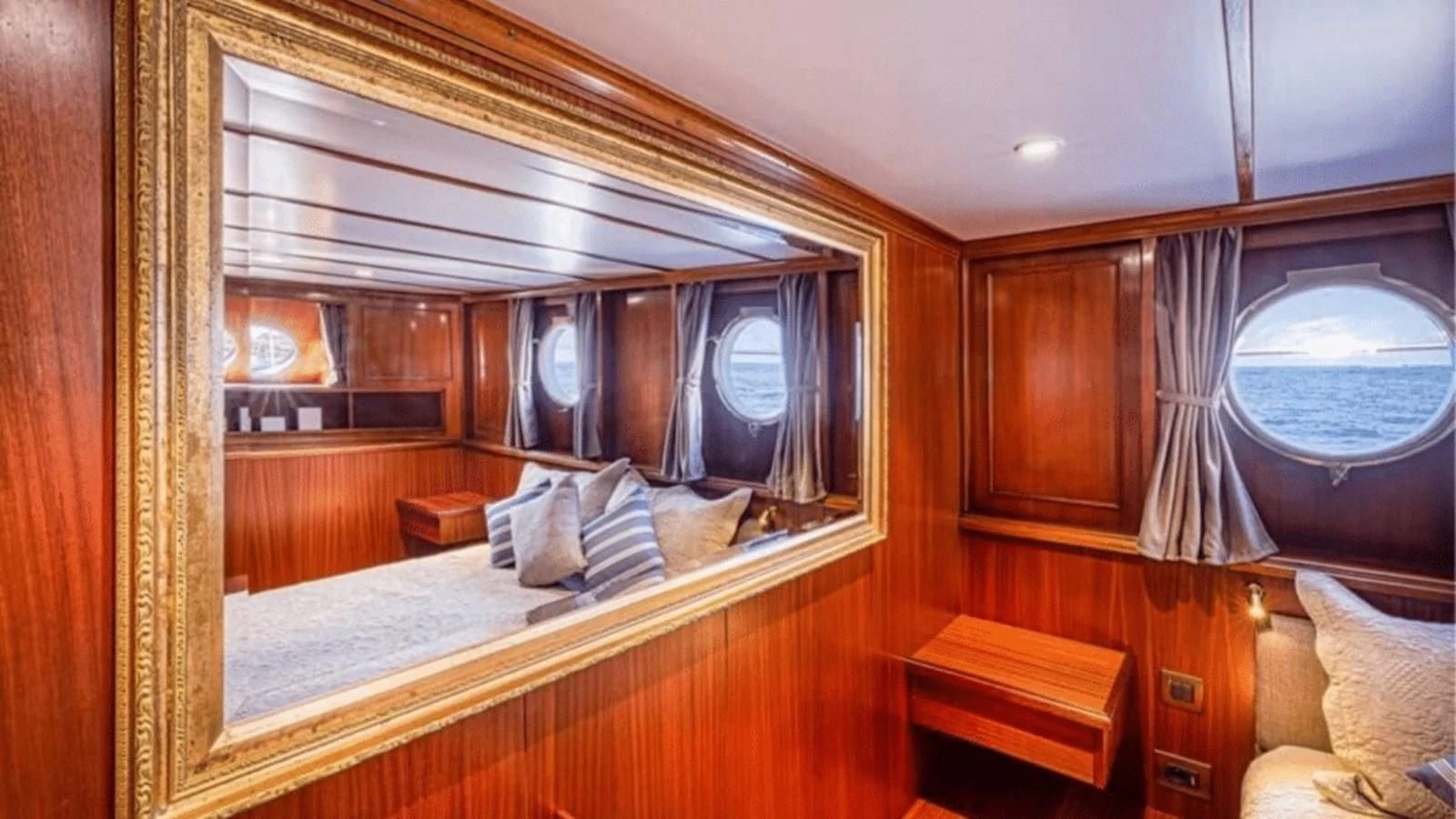 a mirror in a room aboard CHANTELLA Yacht for Sale