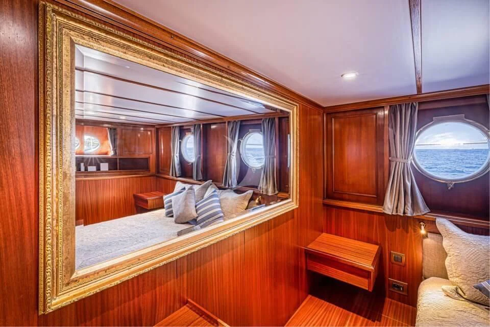 a mirror in a room aboard CHANTELLA Yacht for Sale