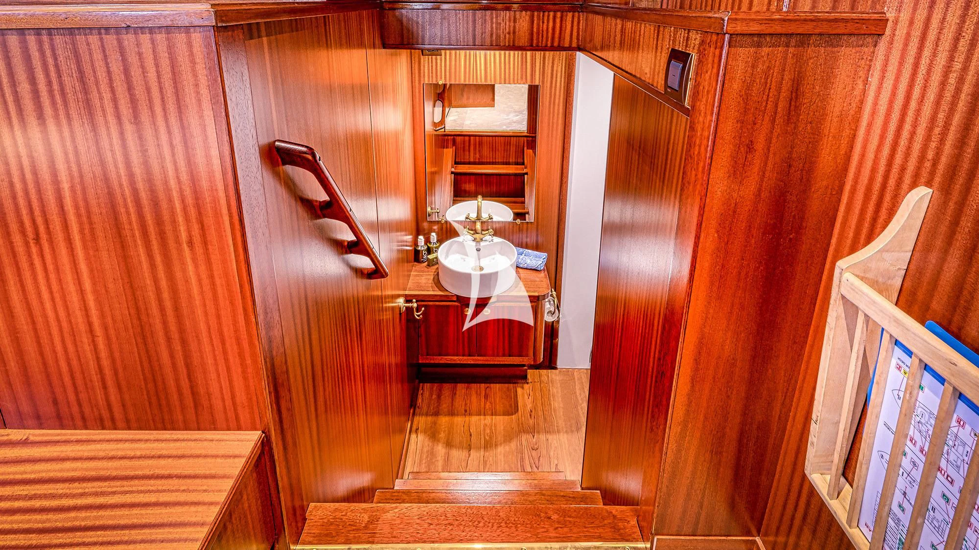 a room with a table and chairs aboard CHANTELLA Yacht for Sale