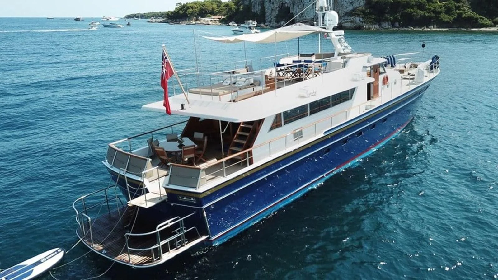a large boat in the water aboard CHANTELLA Yacht for Sale
