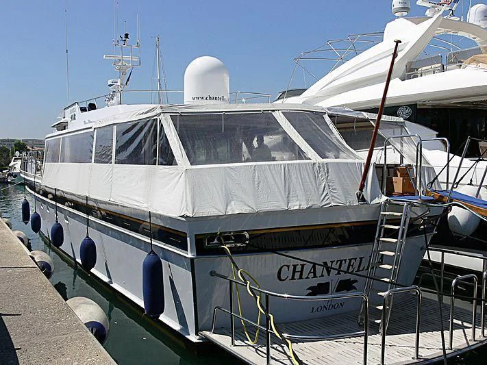a large white boat aboard CHANTELLA Yacht for Sale