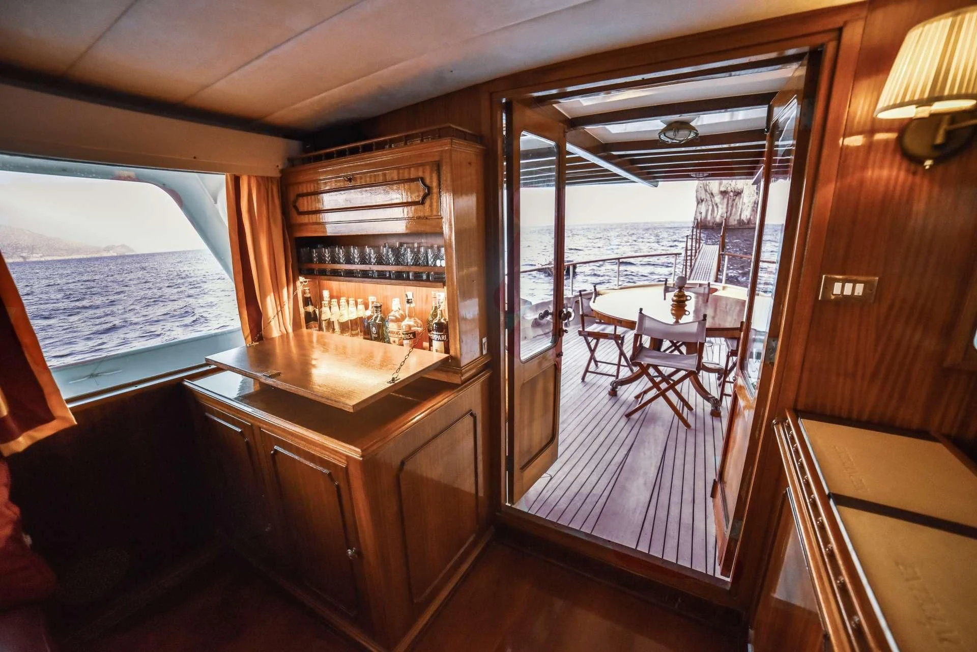 a cabin with a view of the ocean aboard ENTRANCER Yacht for Sale