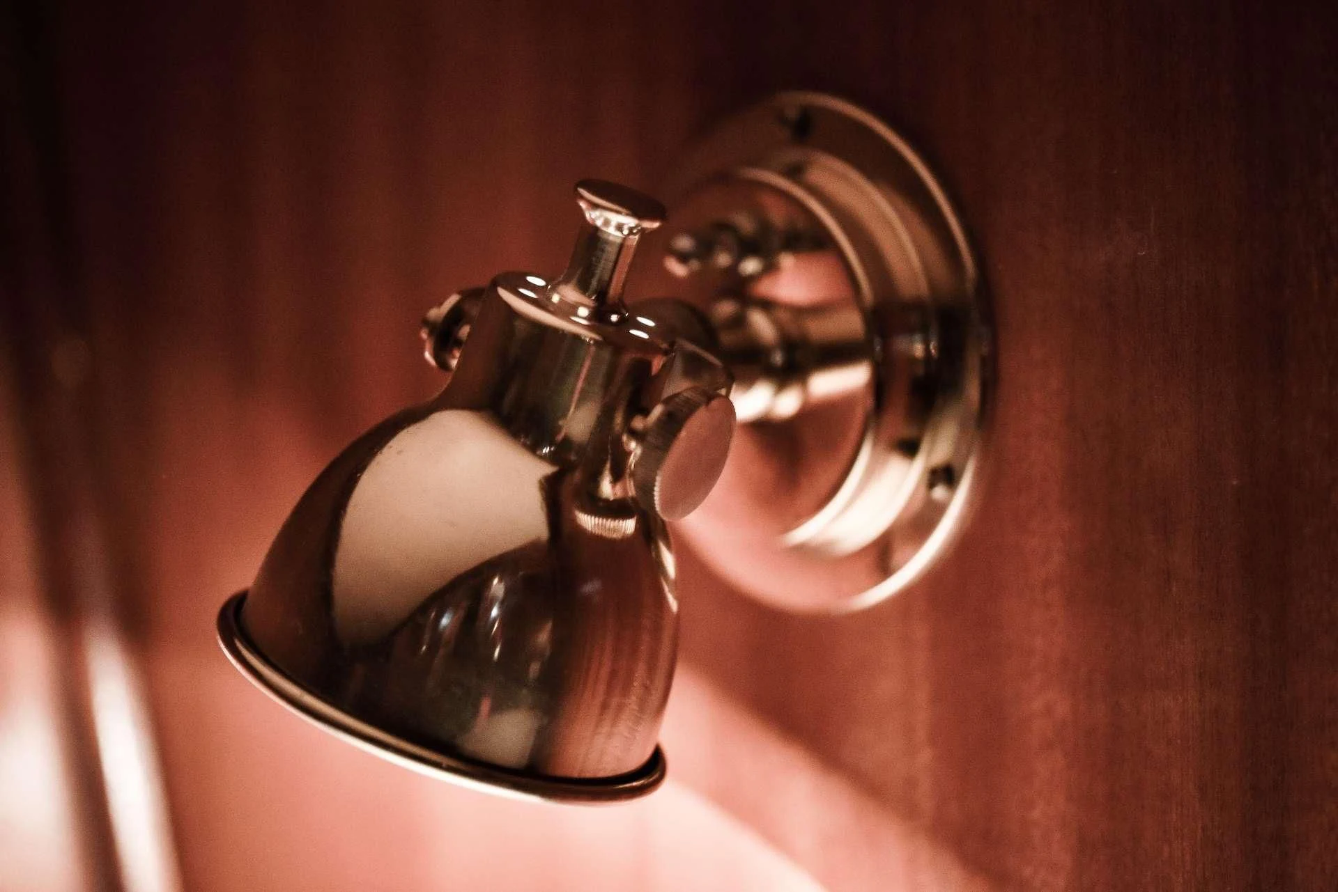 a pair of silver and black metal rings on a wooden surface aboard ENTRANCER Yacht for Sale