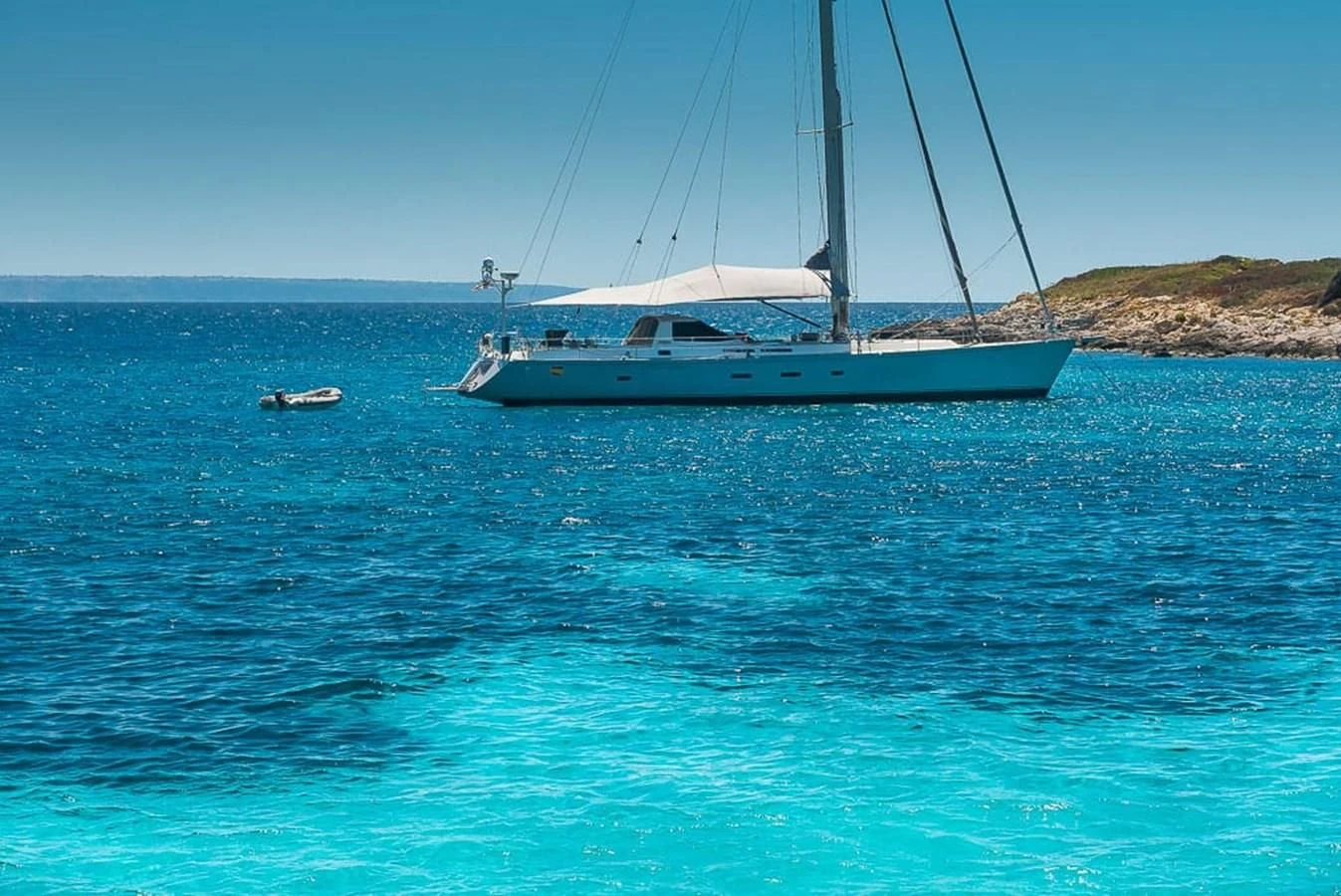 a boat sailing in the sea aboard OCEAN PHOENIX Yacht for Sale