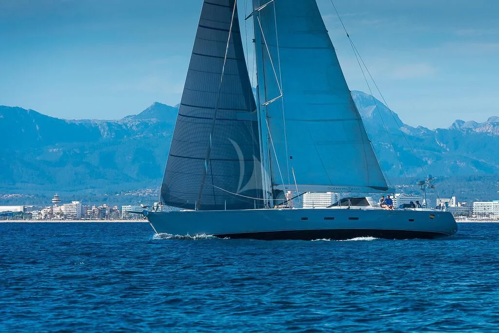 a sailboat on the water aboard OCEAN PHOENIX Yacht for Sale