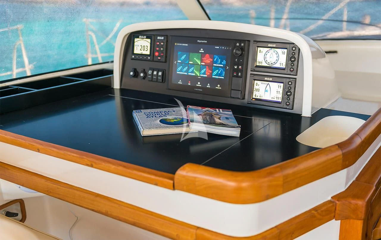 a black electronic device aboard OCEAN PHOENIX Yacht for Sale
