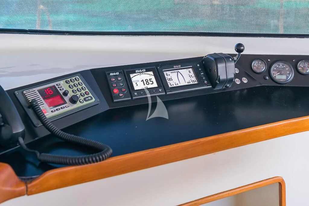the inside of a car aboard OCEAN PHOENIX Yacht for Sale